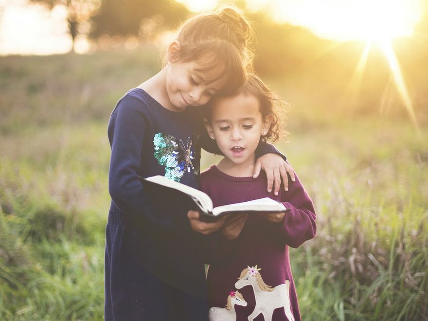 A school-age child outdoors.